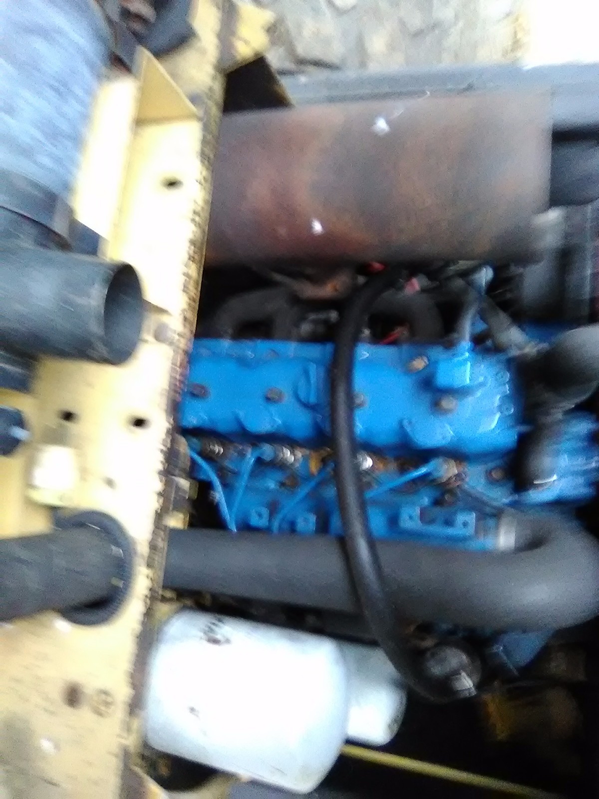 New Holland 553 skid steer.Rebuilt kabota diesel.Wi