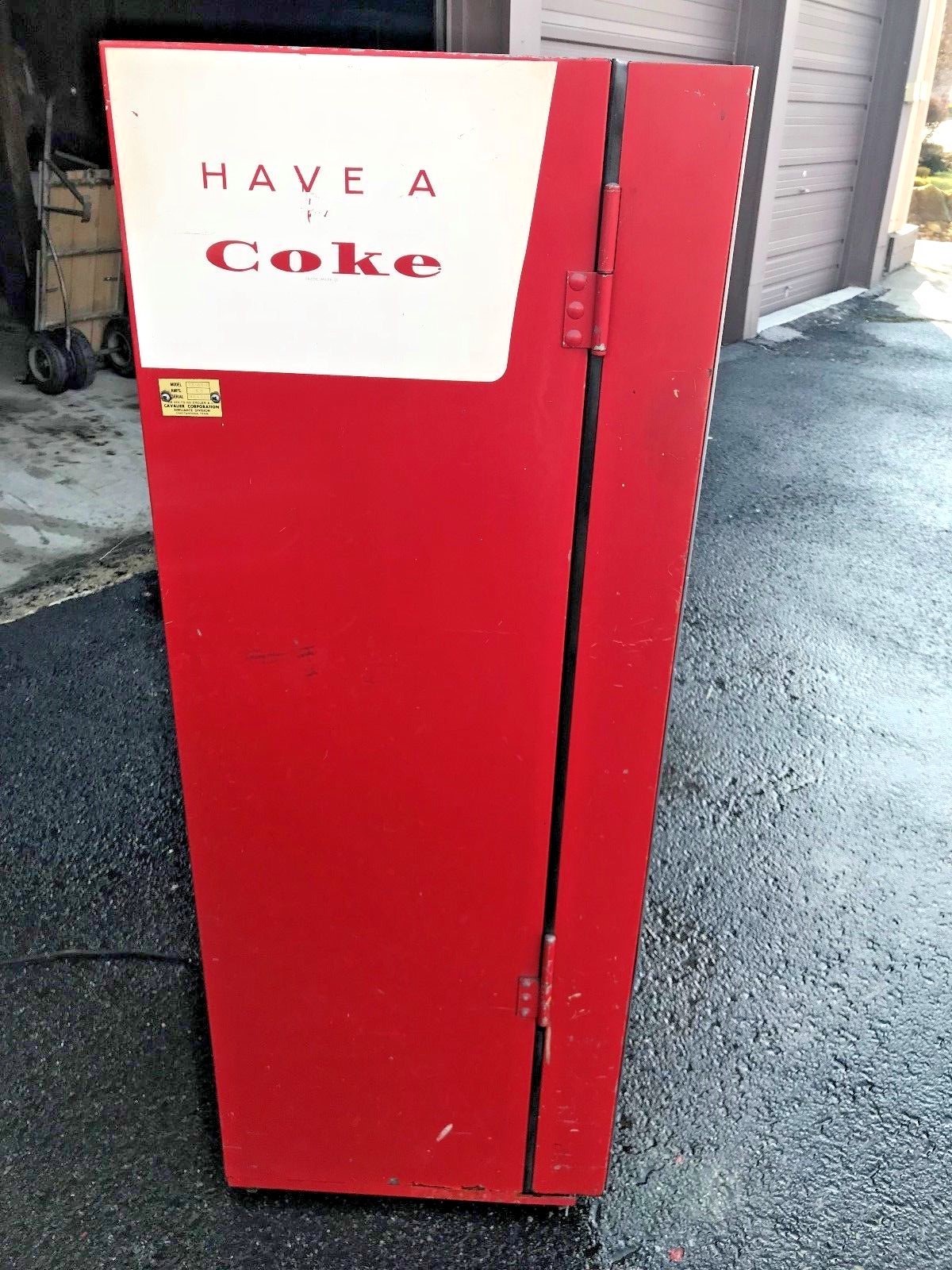 Original vintage Coca Cola bottled vending machine.