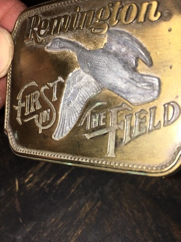 VINTAGE REMINGTON BELT BUCKLE - FIRST IN THE FIELD