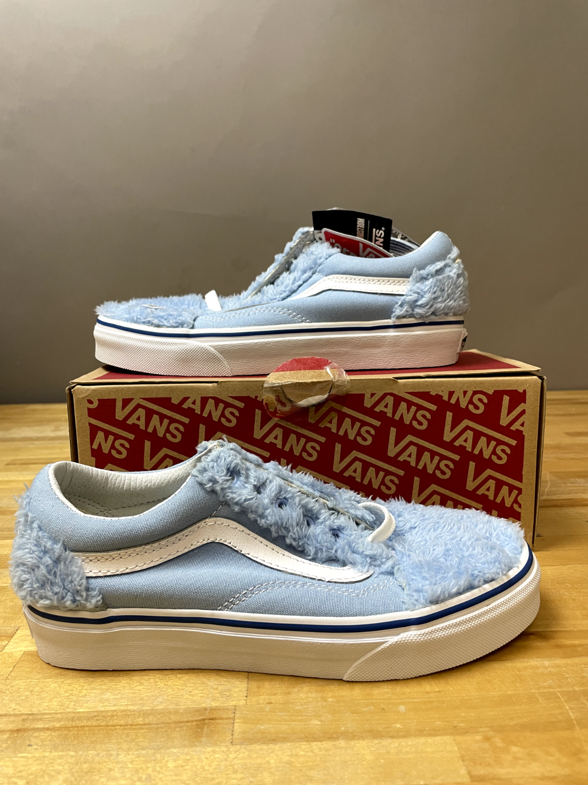 Baby blue top low top vans
