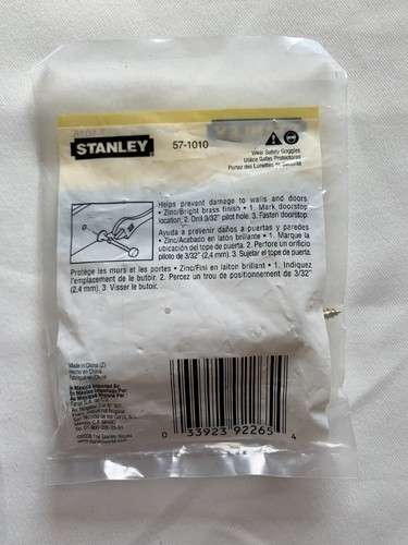 STANLEY SOLID DOORSTOP BRASS FINISH WHITE STOPPER