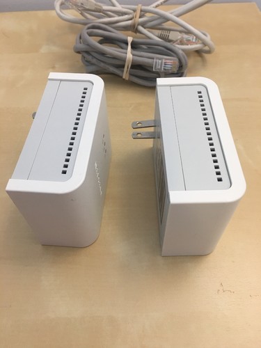 Two Netgear 85 Mbps Wall-Plugged Ethernet Adapters XET1001 with 2 Cat5 cables