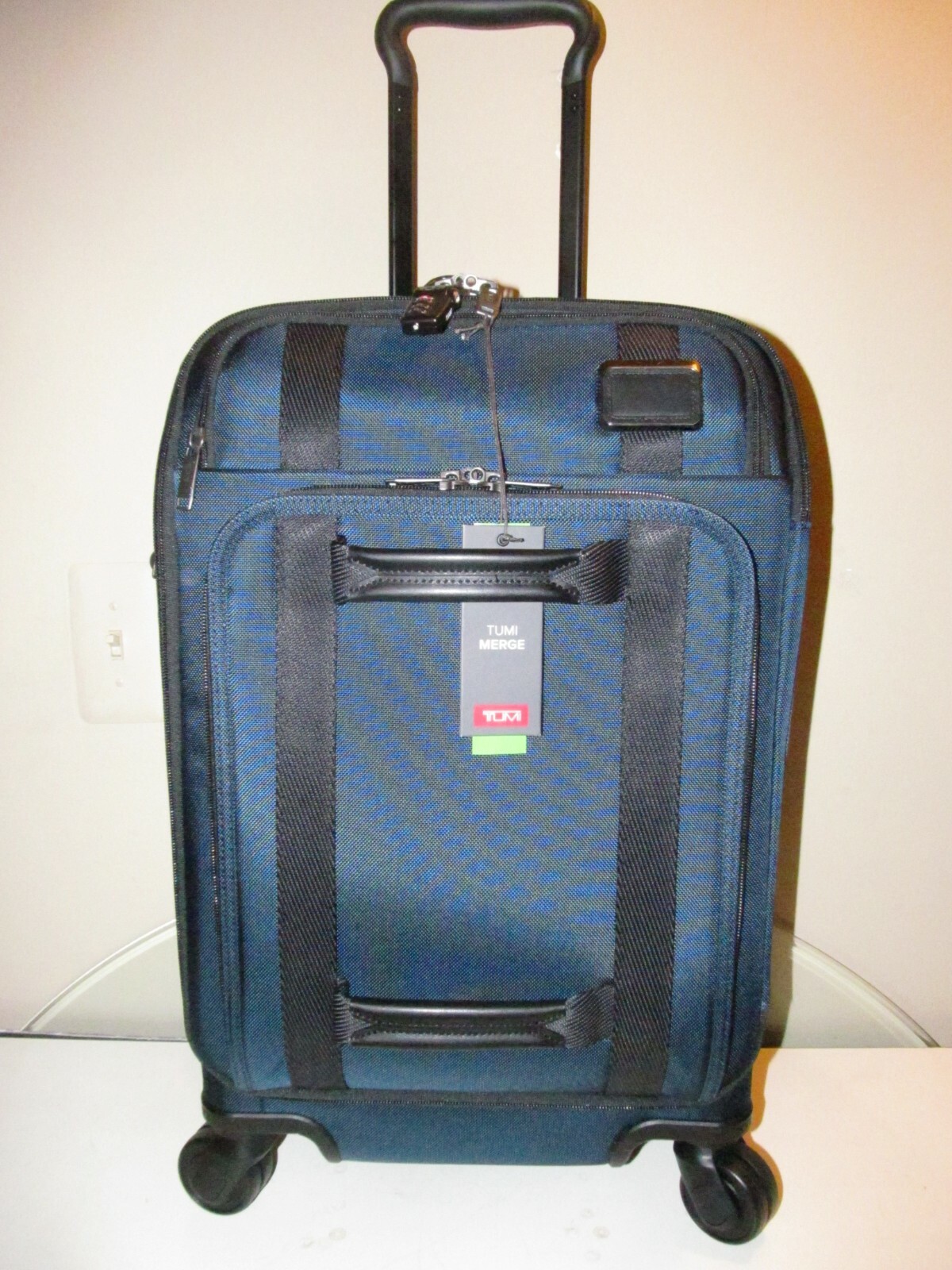 tumi carry on spinner