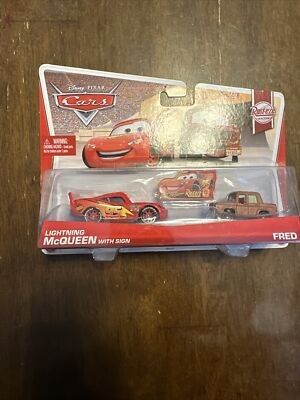 Disney Pixar Cars 2 - Lightning McQueen with Sign & Fred Rust-Eze Racing #5 #6 