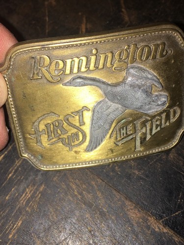 VINTAGE REMINGTON BELT BUCKLE - FIRST IN THE FIELD