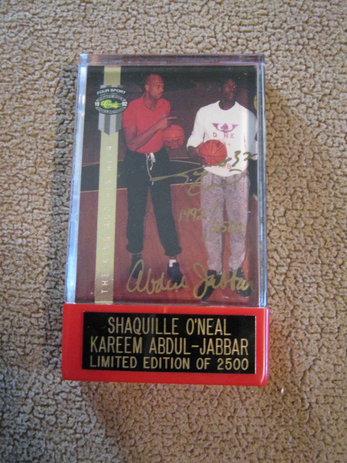 Autographed sport card of Shaquille O'Neal and Abjul Jabbar