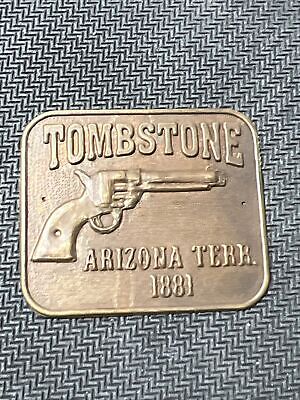 Tombstone Arizona Terr. Peacemaker curved brass gun grip butt tag badge