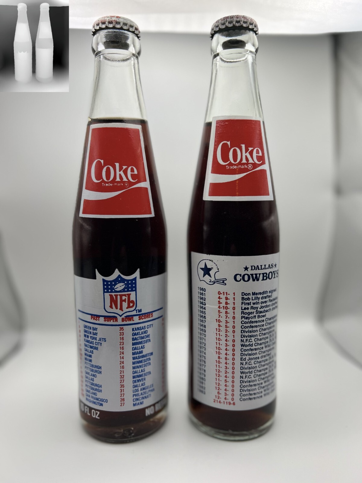 Two (2) 1984 Dallas Cowboys - Super Bowl XVIII Commemorative Coke Bottles