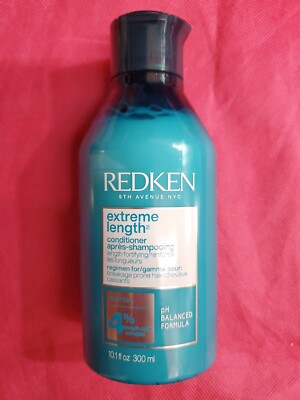 Redken  Extreme Length Conditioner 10.1 OZ. SOME SCRATCH