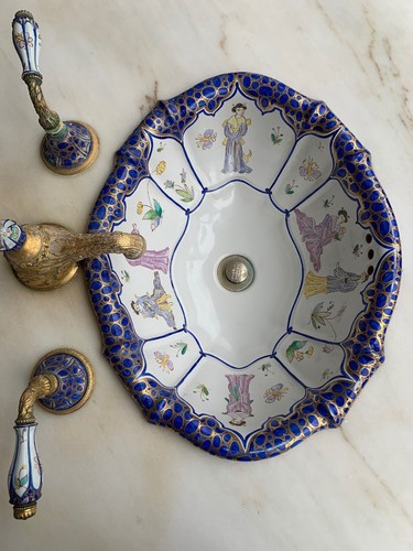 Sherle Wagner sinks With Matching Faucets And Marble Slab