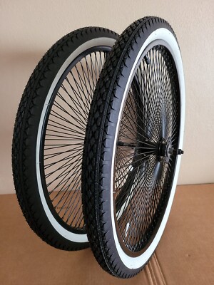VINTAGE LOWRIDER 26'' 144 SPOKE BLACK DAYTON RIM SET W/ WHITE WALL DIAMOND TIRES.