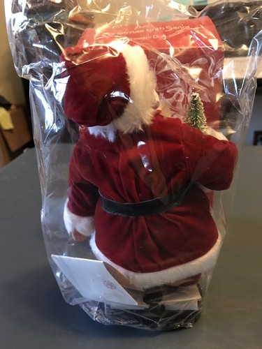 Avon Christmas With Santa Porcelain Doll 1989 w/box and Stand