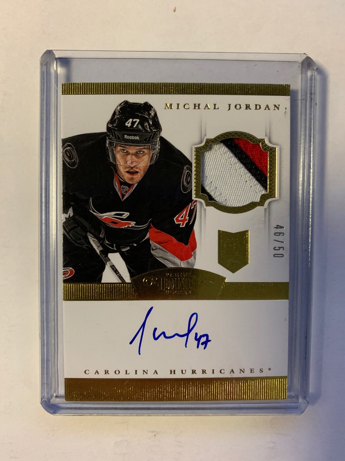 13-14 2013-14 DOMINION MICHAL JORDAN ROOKIE PATCH AUTO /50 HURRICANES GOLD