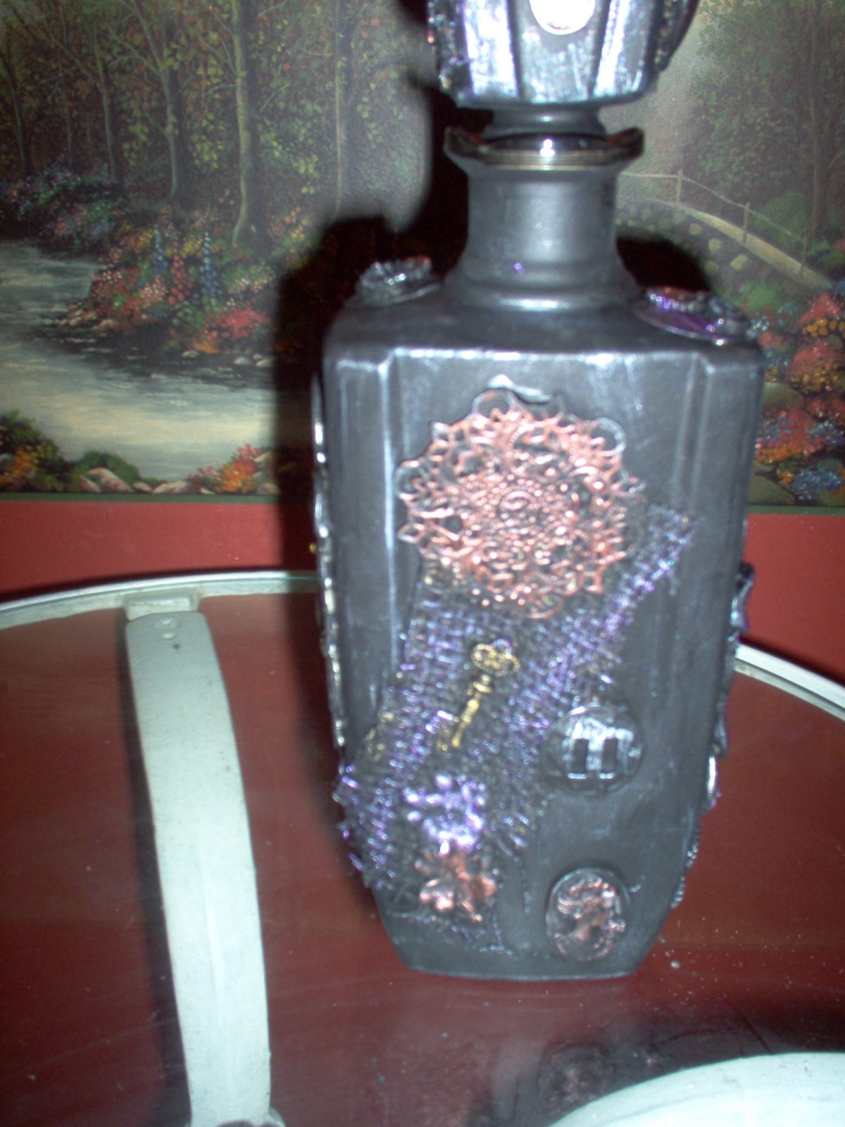 steampunk/altered art decanter, black, metallic highlights. 11