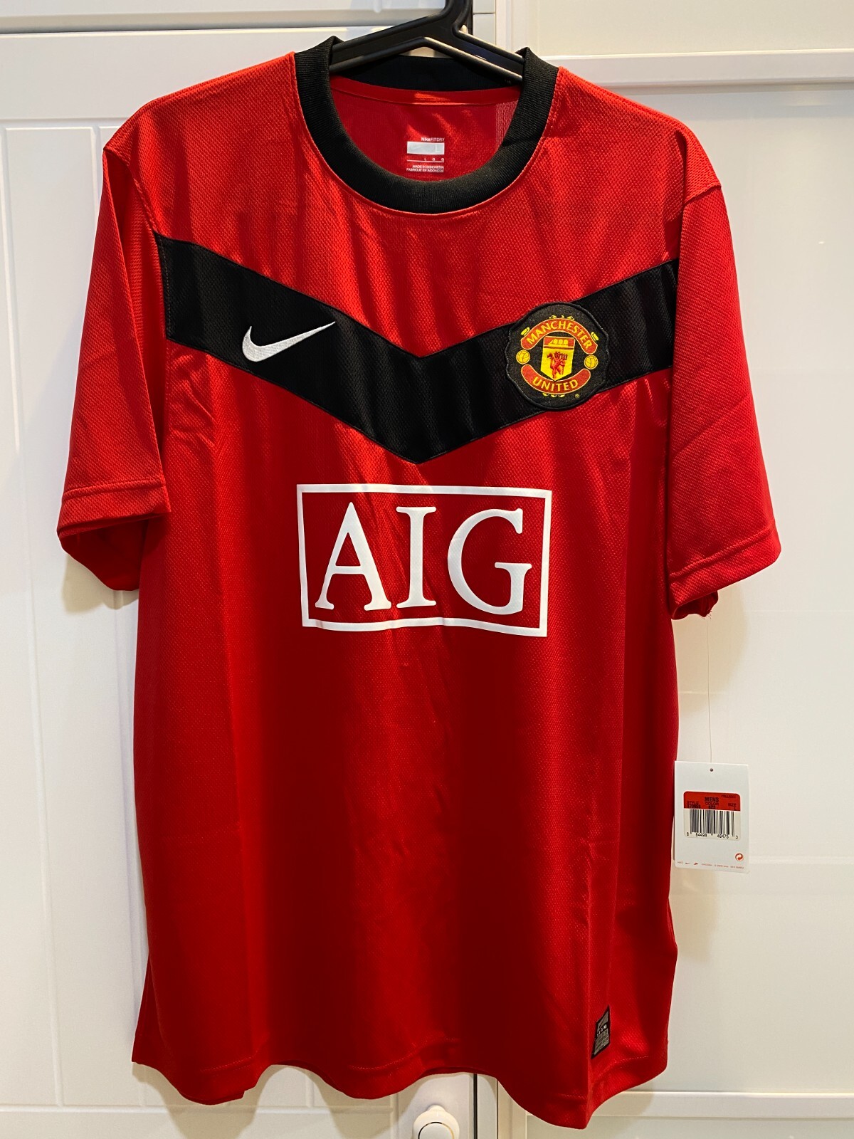 Nike Manchester United 長袖シャツ 黒 Nike Black Manchester United International Club Soccer Fan