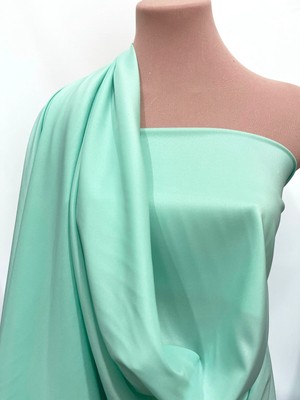 STRETCH POLYESTER LINING FABRIC CARIBBEAN TURQUOISE 48 '' BLOUSES SUITS, BTY