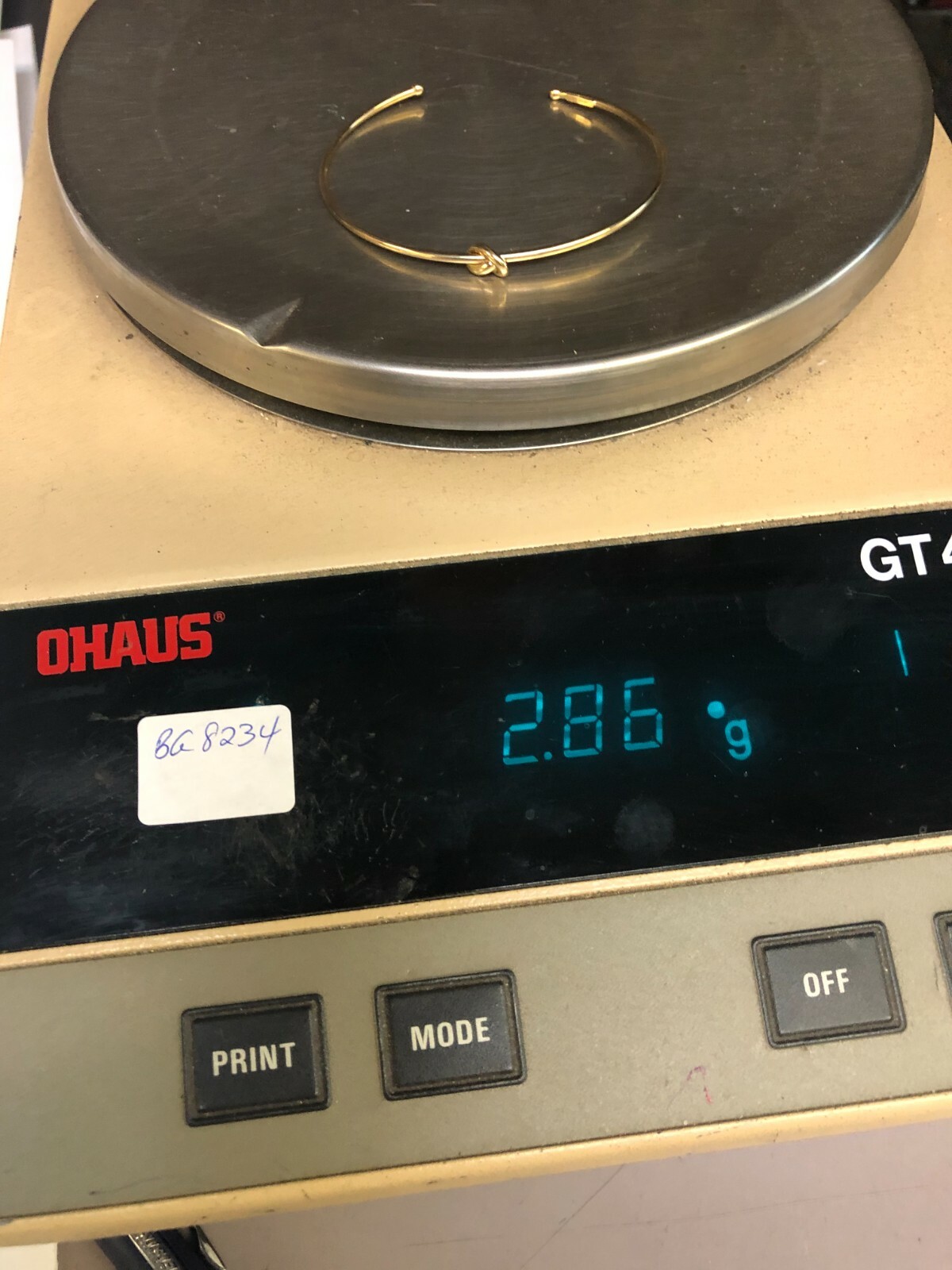 Pre-owned R C I 14k Yellow Gold Slip-on Polished Love Knot Bangle In No Stone