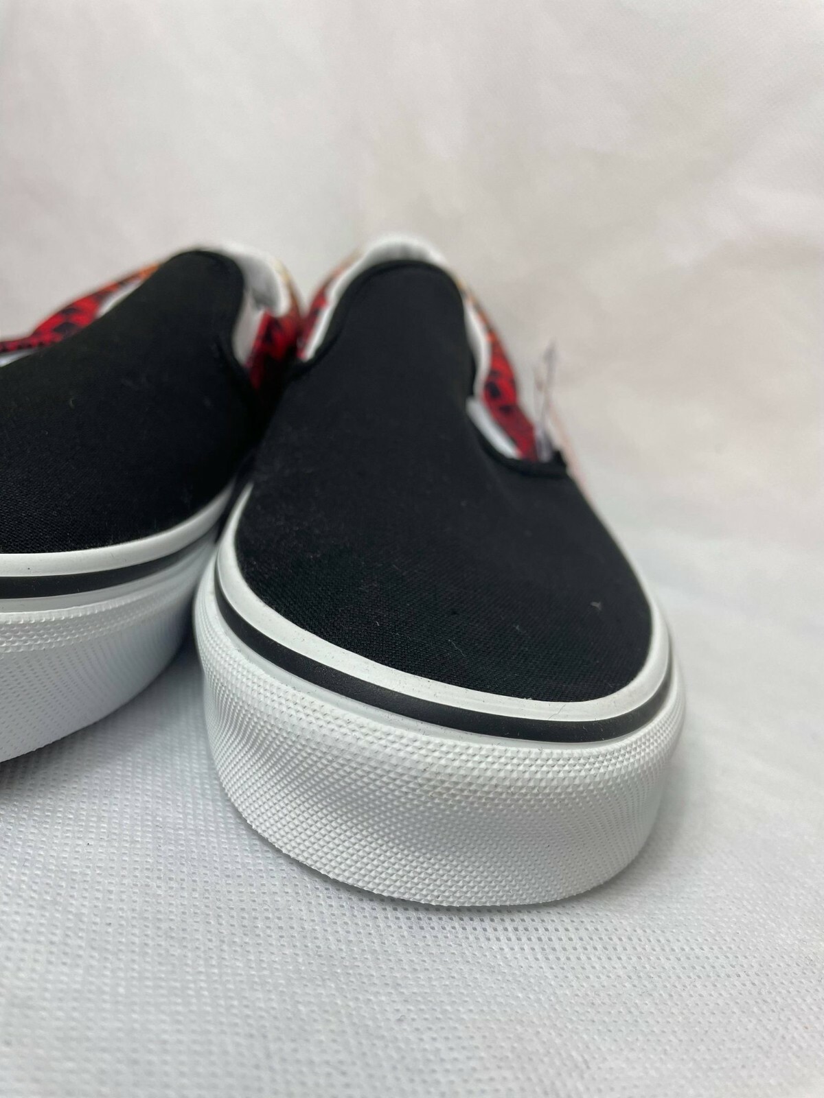 vans slip ons red flames