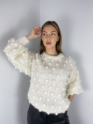 white bobble jumper