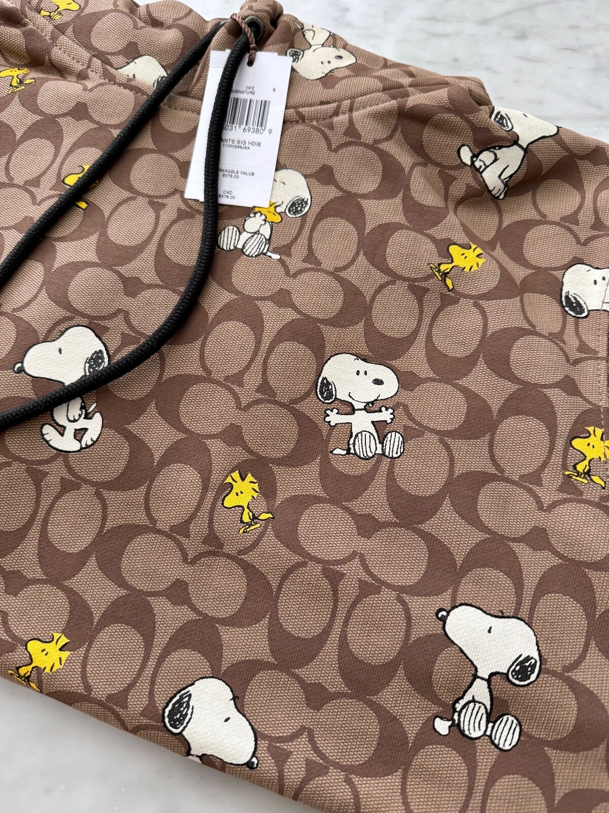PEANUTS × COACH スヌーピーシグネチャーフーディー　Lサイズ COACH コーチ ☆COACH☆ シグネチャー スヌーピー フーディー