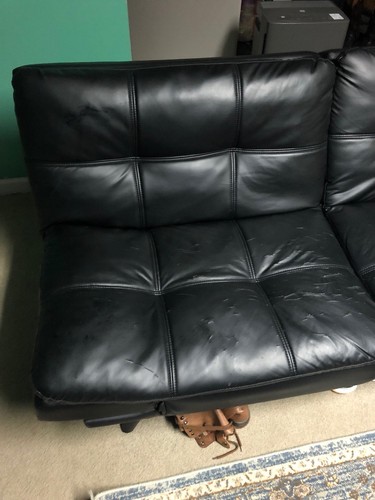 Two Faux Leather Futons