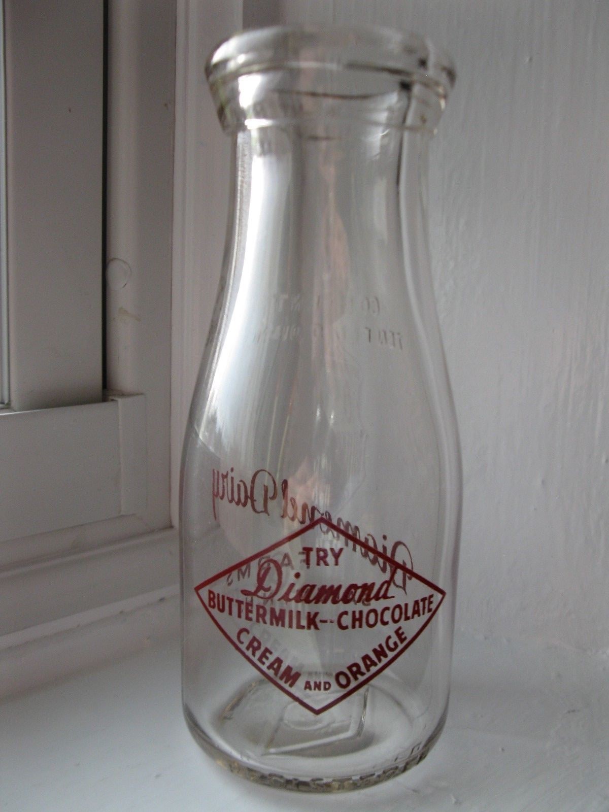 Vintage milk bottle Diamond Dairy Farms Salem, N.H. RD pyro