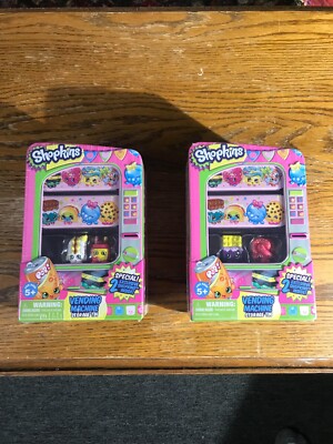 2013 Shopkins Vending Machine Storage Tin, two packages plus a collectors guide