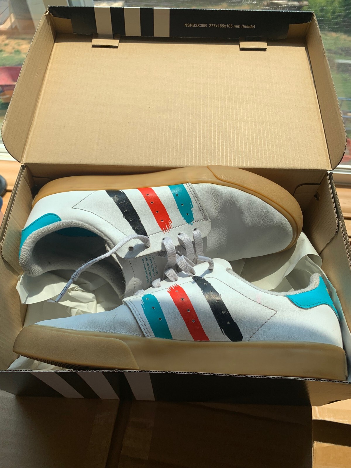 nmd r1 red blue black