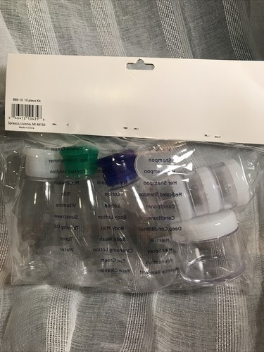 SPRAYCO ON THE GO 10 piece carry on kit. NEW CLEAR AIRPLANE TSA BOTTLES 