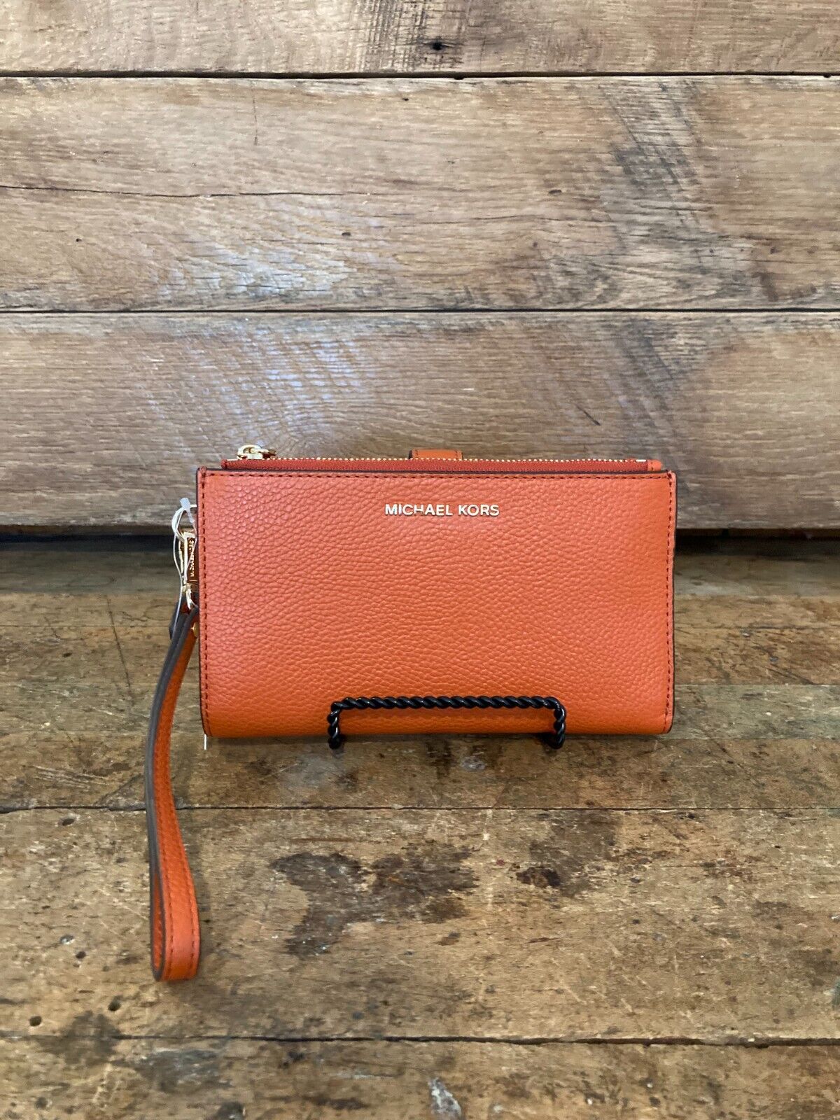 Orange michael kors wallet hotsell