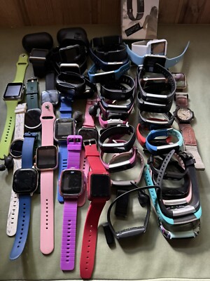 Huge Lot of 50+ Smart Watches Fitness Trackers & Other Electronics
