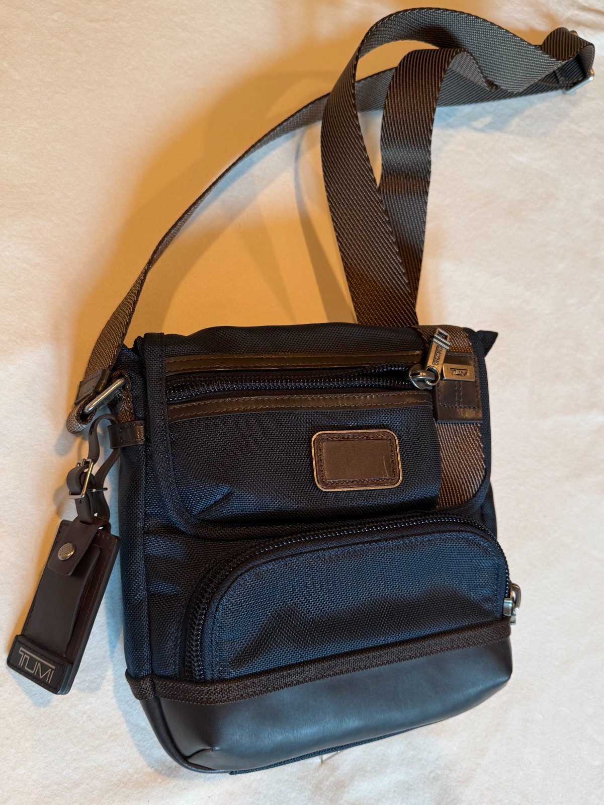 TUMI Navy BlueBrown Canvas and Leather Alpha Bravo Barstow