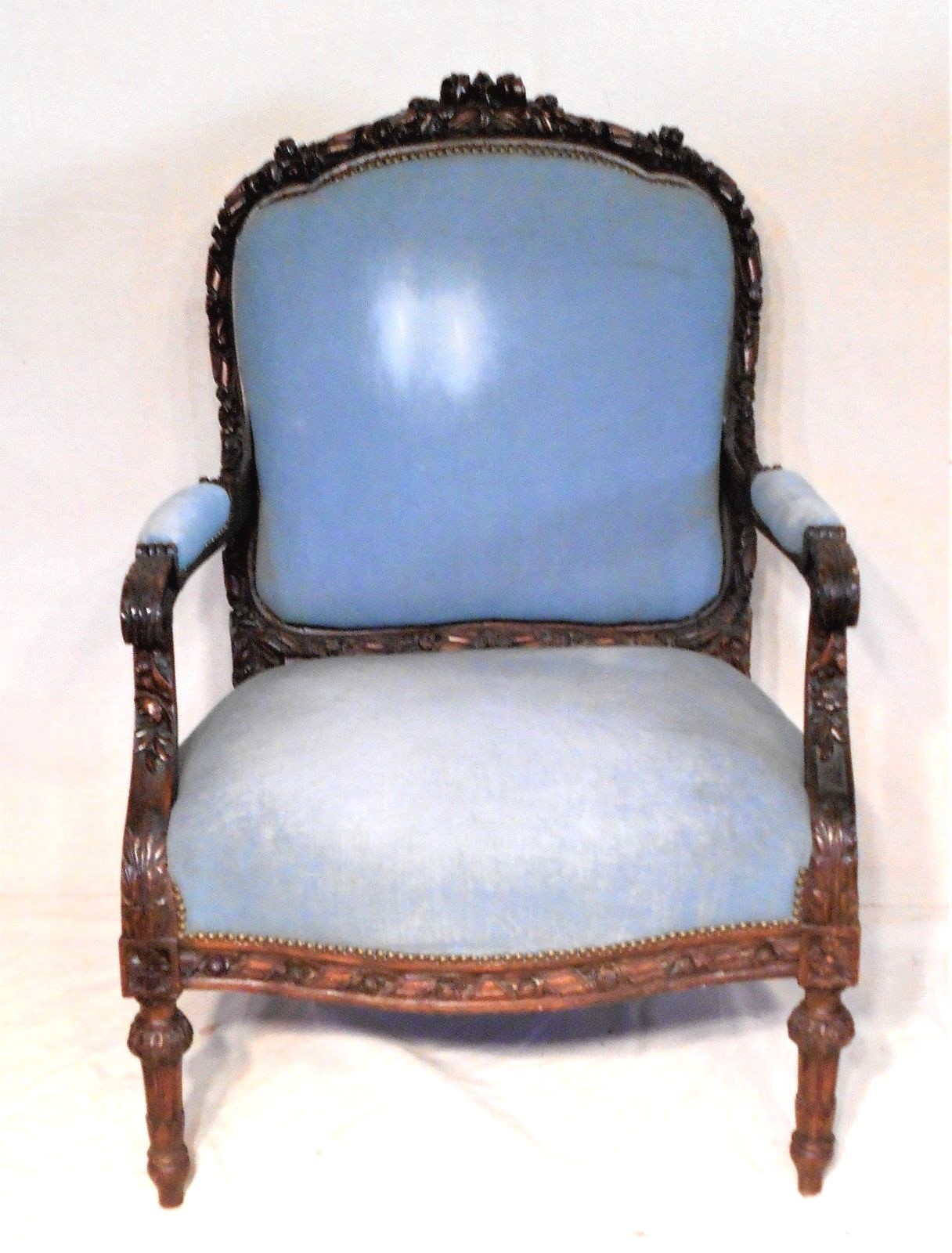 A GREAT OVERSIZE HAND CARVED VICTORIAN LOUIS XVI WALNUT UPHOLSTERED ARMCHAIR