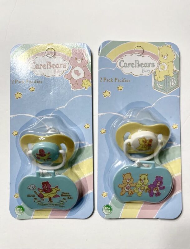 BABY PACIFIERS 2 PC YELLOW/GREEN COLOR PACIFIER HOLDER BY CARE BEARS