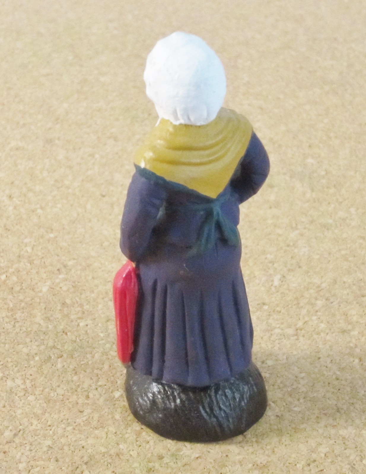 Castelin-Peirano French Nativity santon #2 or #3 woman with garlic and umbrella