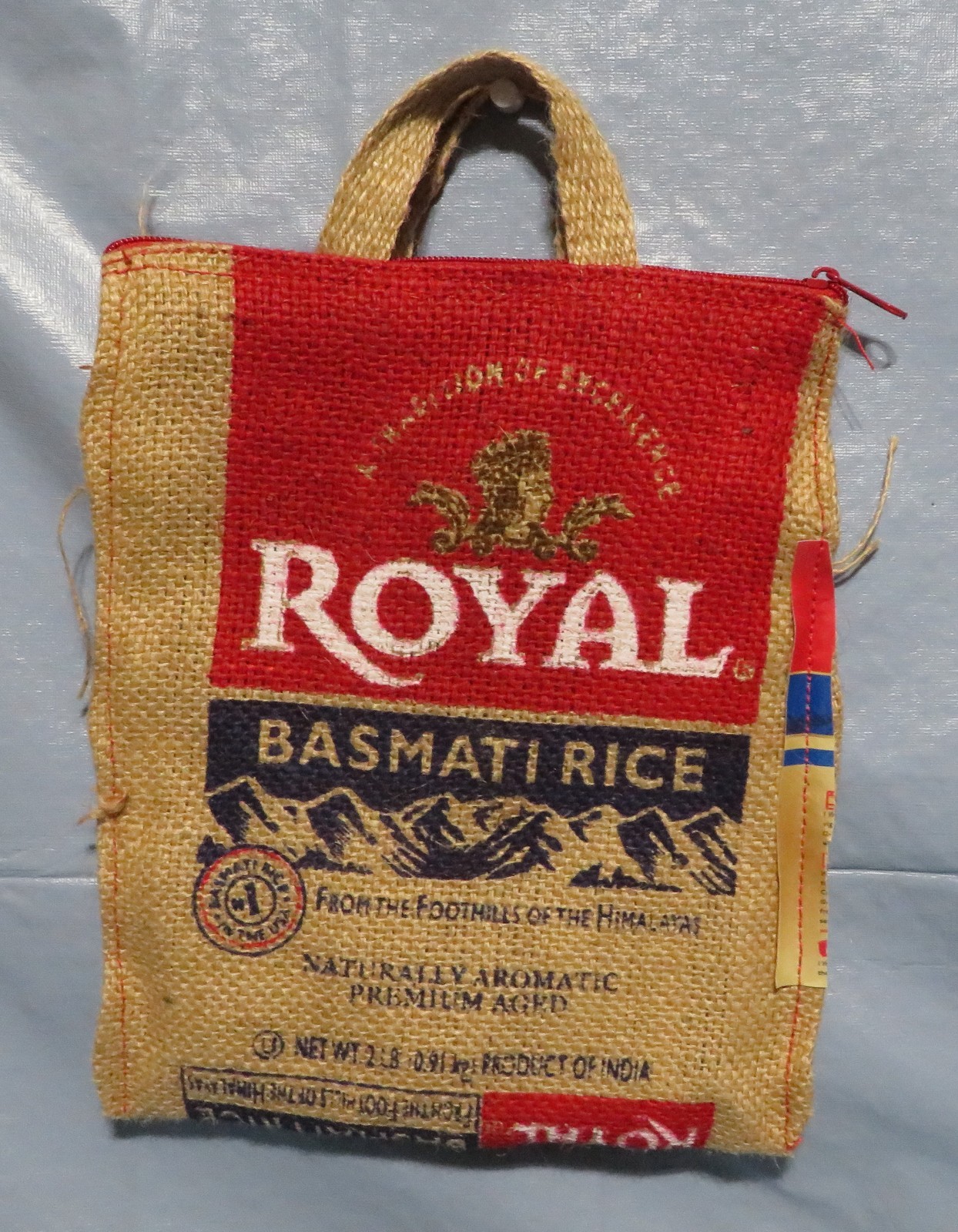 ROYAL BASMATIC RICE BURLAP SACK WITH HANDLES AND TOP ZIPPER BAG CHILDS