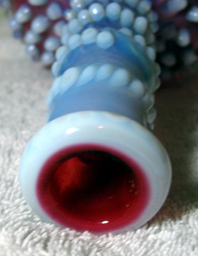 A Nice Antique Cranberry Opelescent Hobnail barber bottle