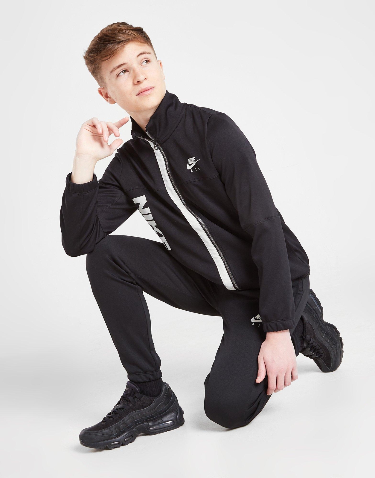 nike tracksuit bottoms age 13