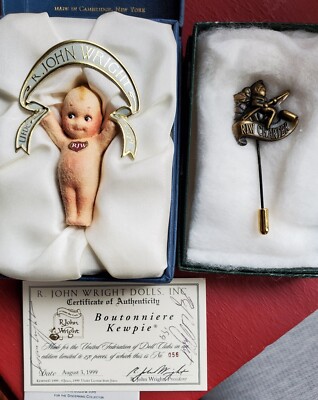 R. John Wright 1999 UFDC Boutonnière and Charter Pin Kewpies