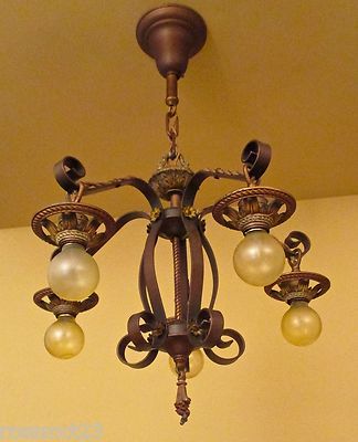 Vintage Lighting matched set by Markel. One chandelier. Four sconces