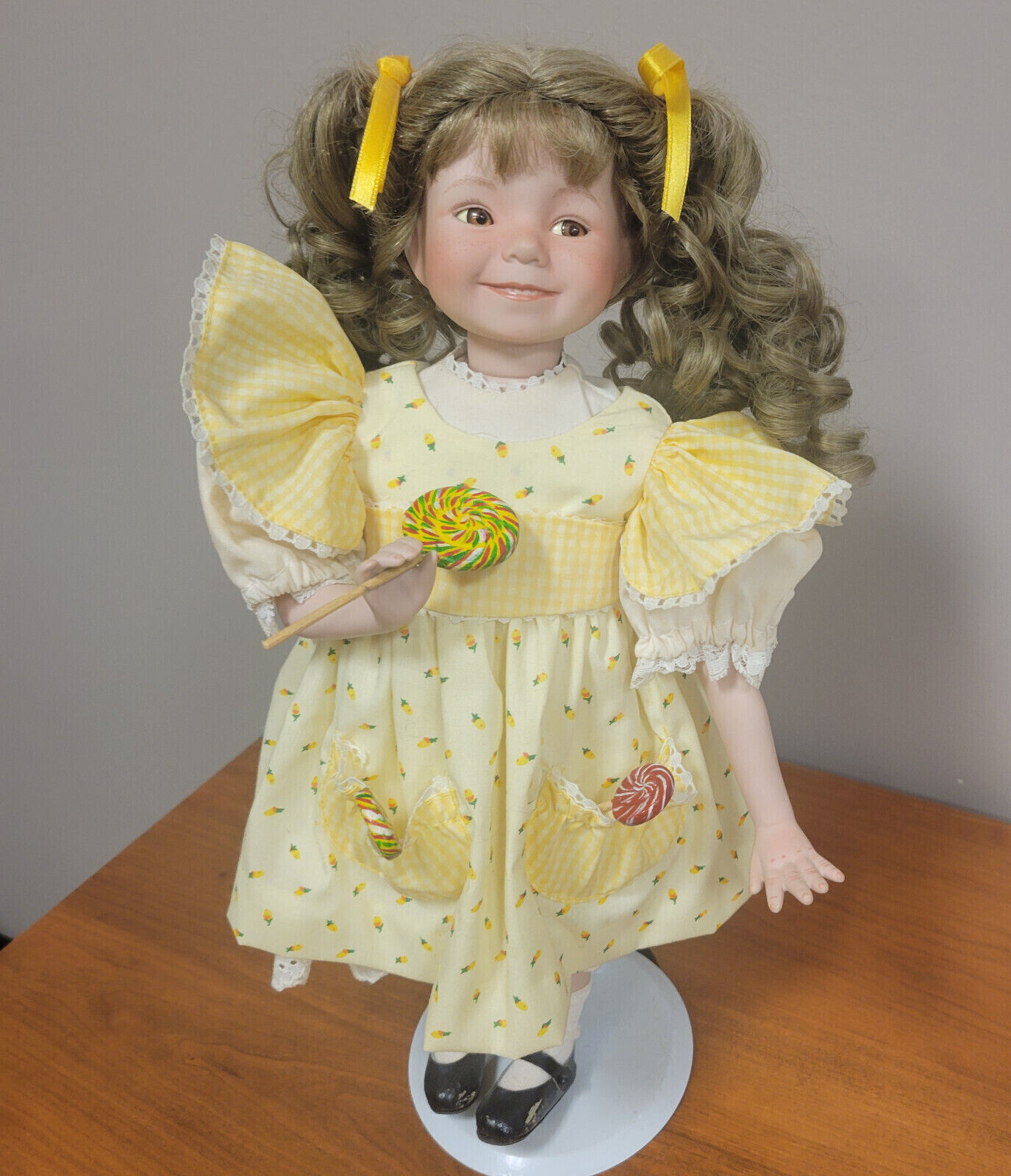 Dianna effner's Porcelain doll, handmade, with yellow dress Dianna effner's Porcelain doll, handmade, with yellow dress