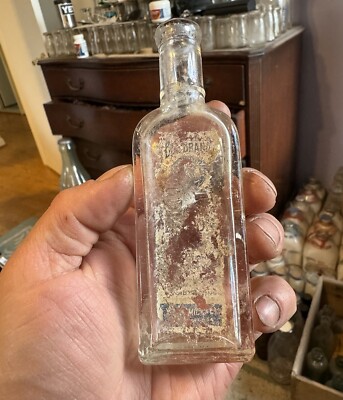 McCormick & Co Bee Brand Baltimore MD Embossed Partial Labeled Extract Bottle