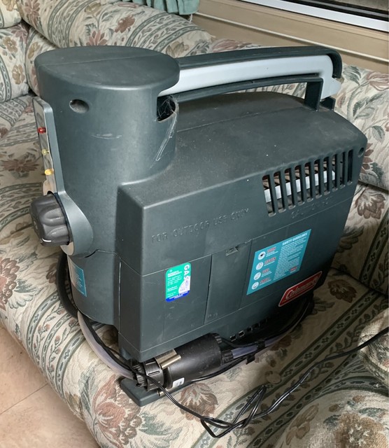 Coleman camping water heater with bucket siphon accessory Camping