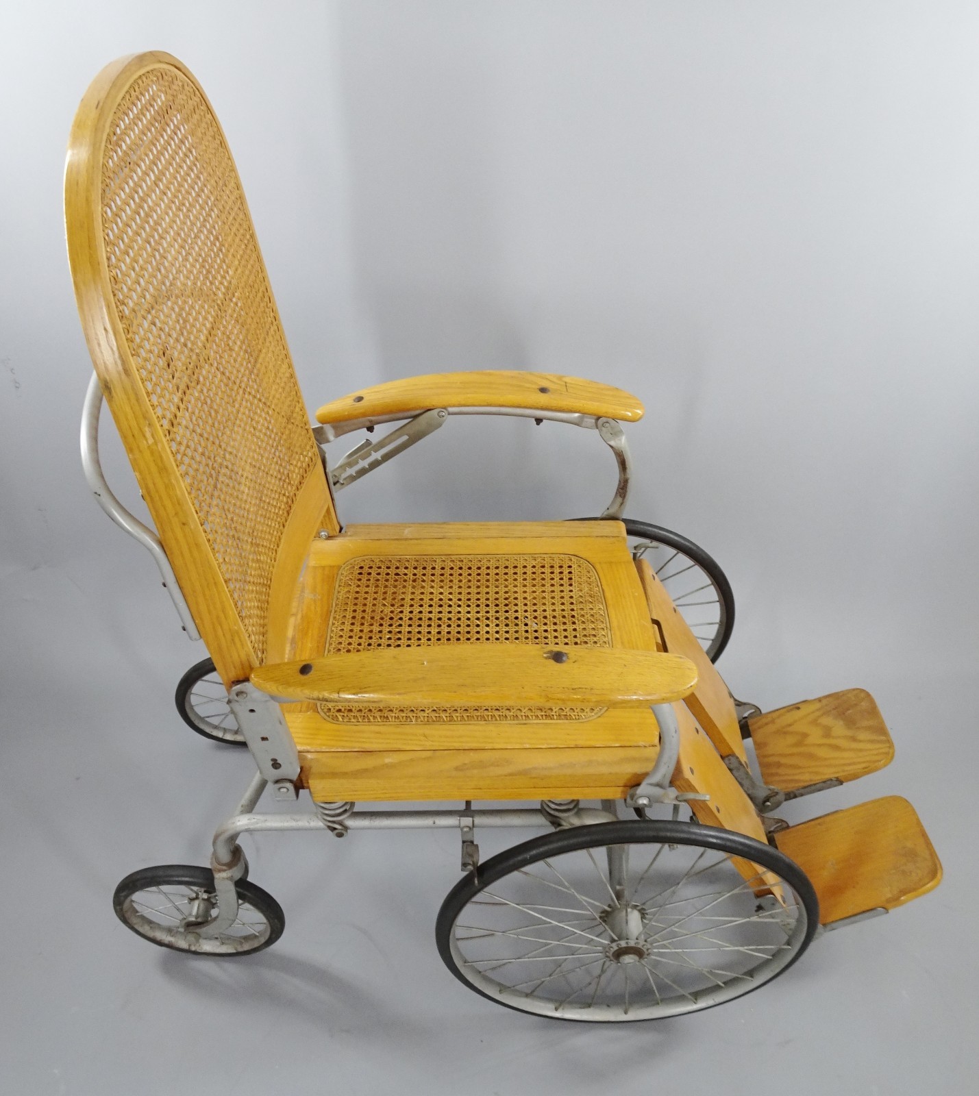 Vintage Wooden and Steel Antique Wheelchair with Cane Seat, Fully Adjustable