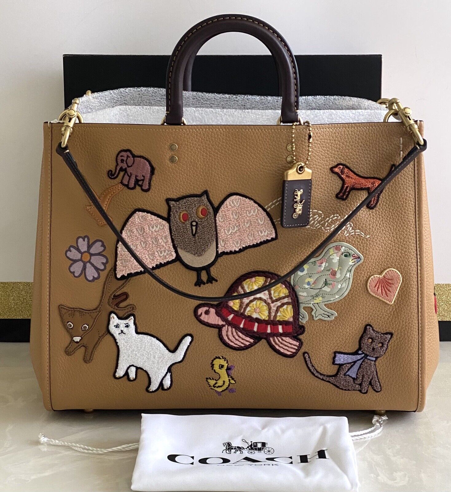 NWT COACH LIGHT TAN/MULTI XL ROGUE 39 WITH ANIMAL CREATURE NWT COACH LIGHT TAN/MULTI XL ROGUE 39 WITH ANIMAL CREATURE