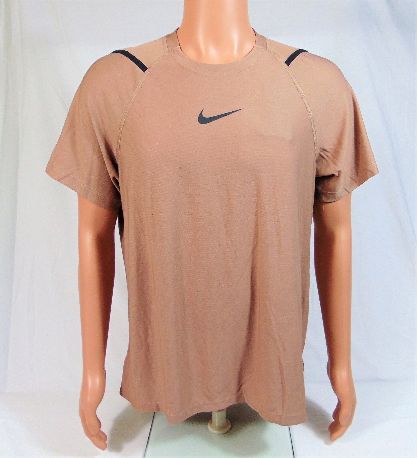 dusty brown nike shirt
