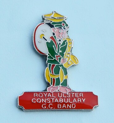 RUC Royal Ulster Constabulary G.C. BAND Comical Pin Badge