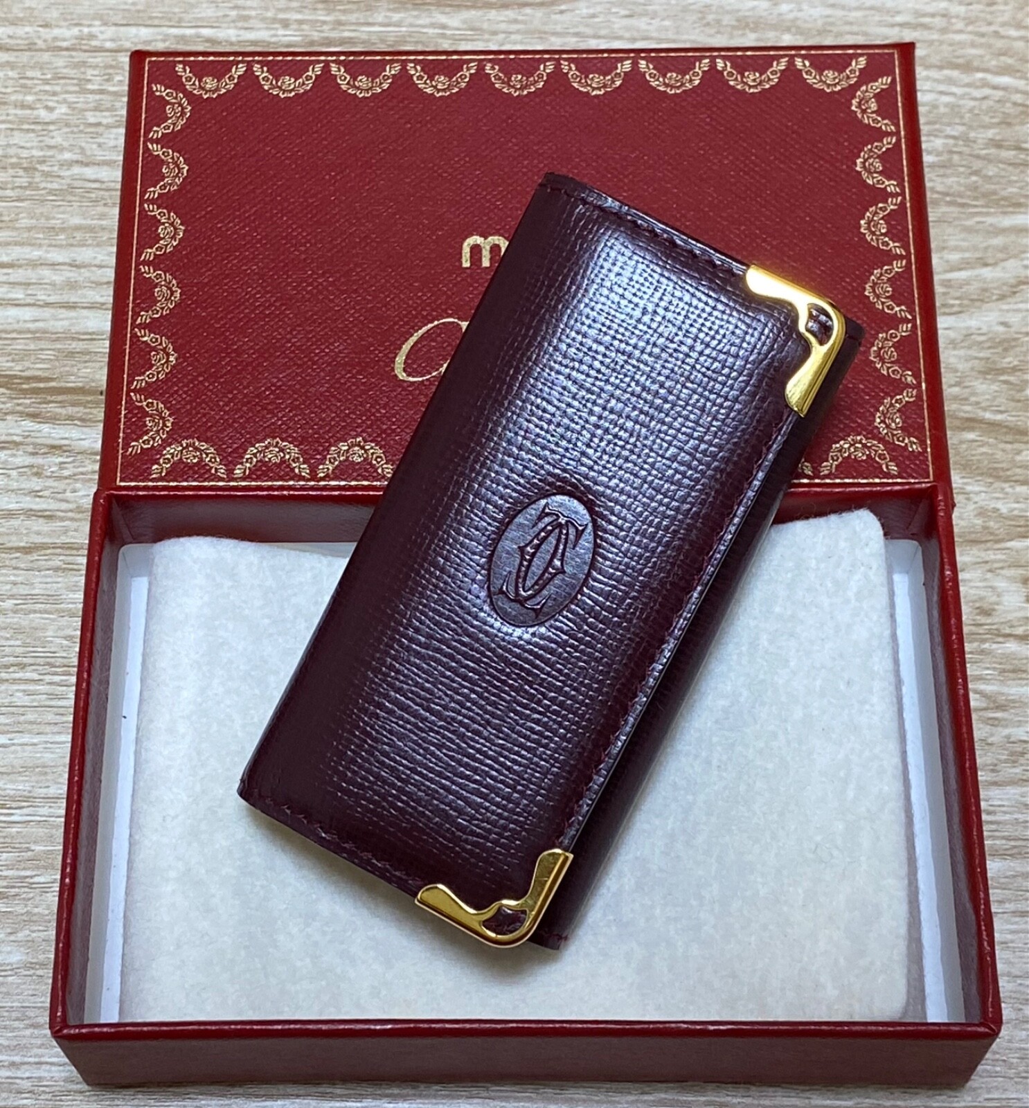 Authentic Cartier leather key holder look unused and in box no