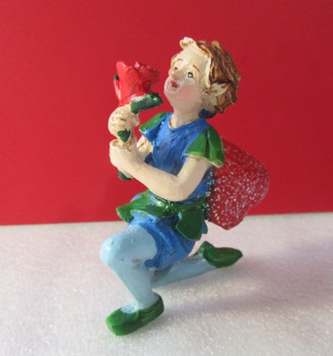 Elf Pixie Fairy On One Knee Holding Rose Flower Resin Figurine
