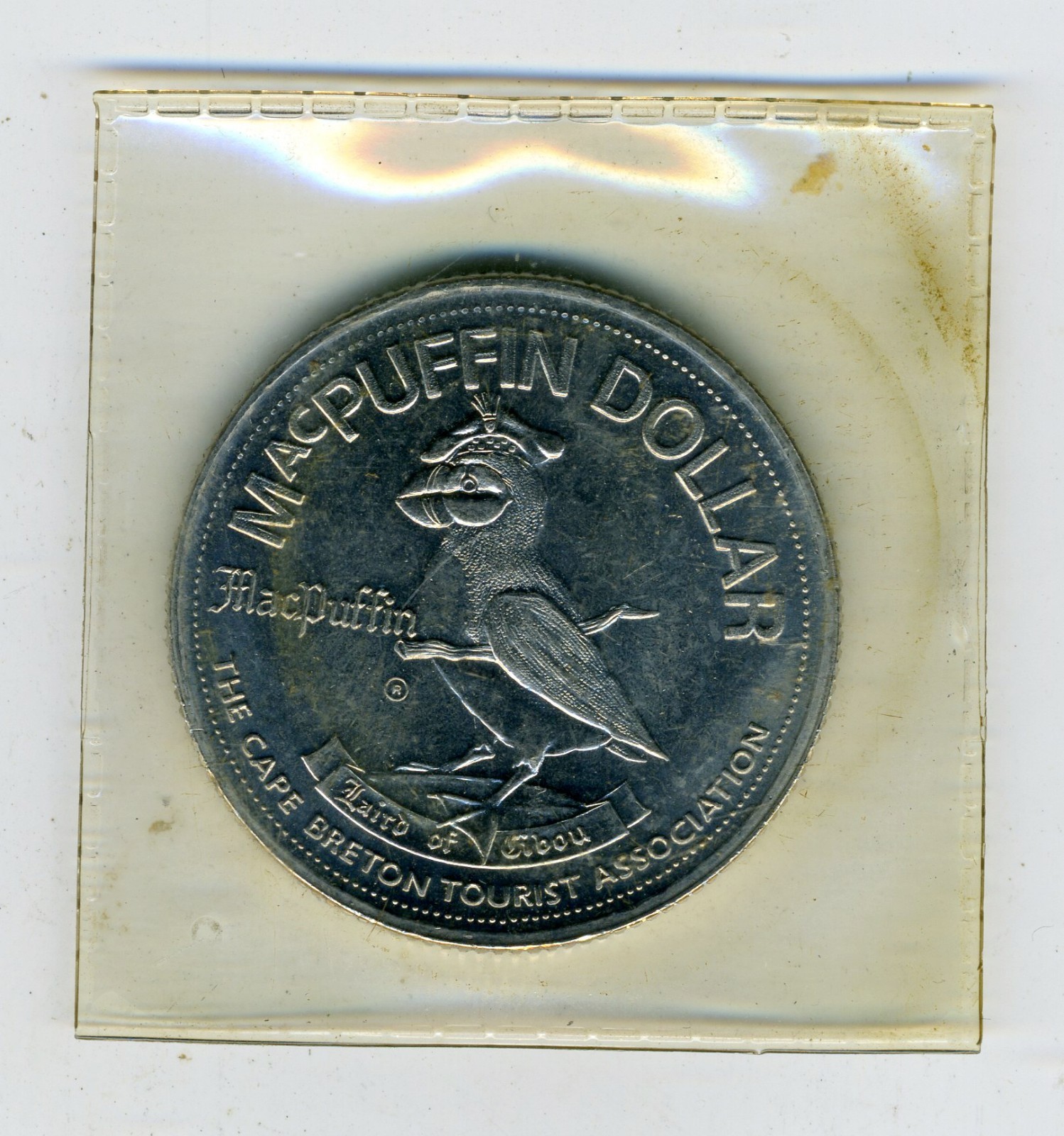 1983 NOVA SCOTIA CANADA THE CAPE BRETON TOURIST ASSOCIATION MCPUFFIN DOLLAR
